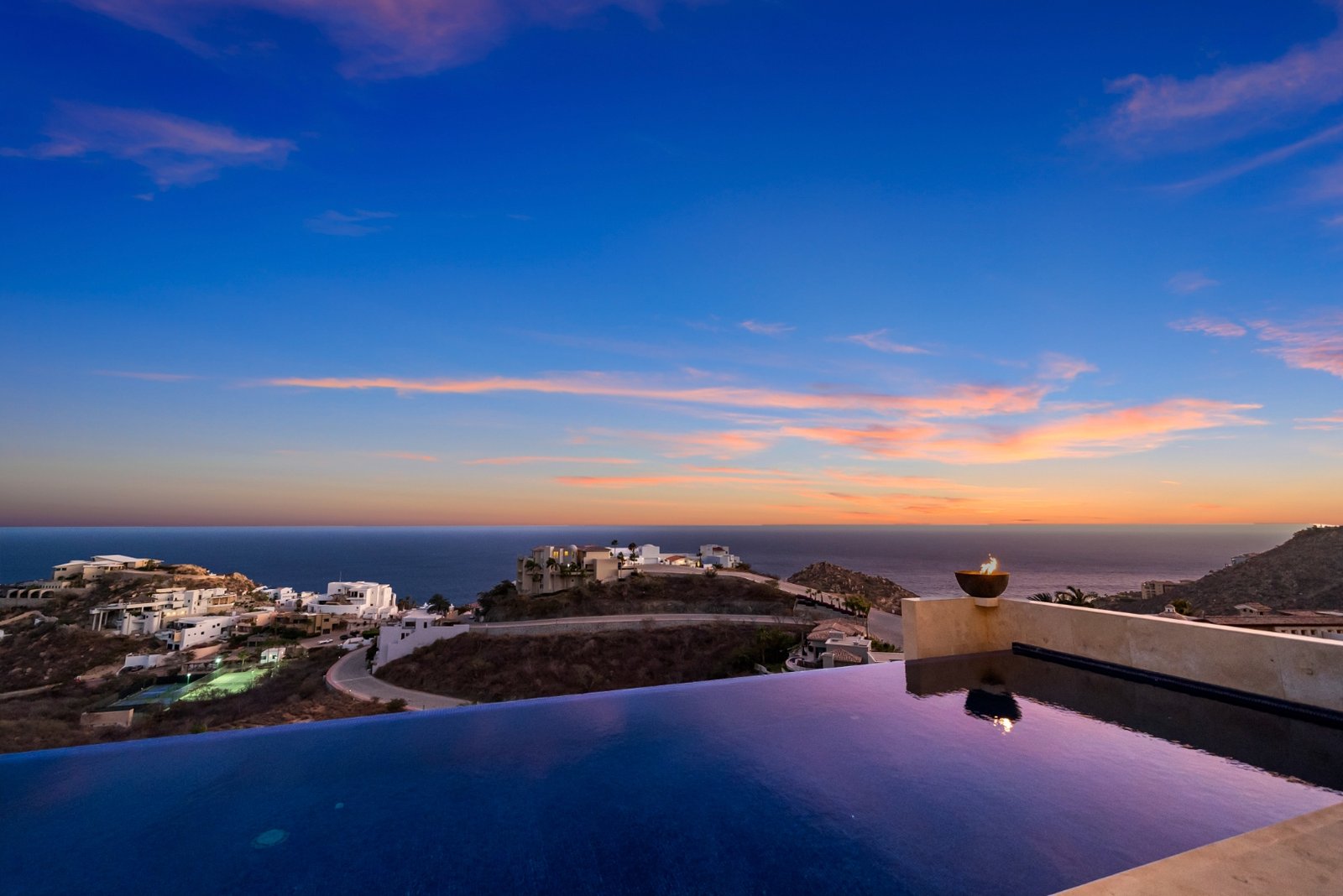 Infinity pool meeting the ocean horizon