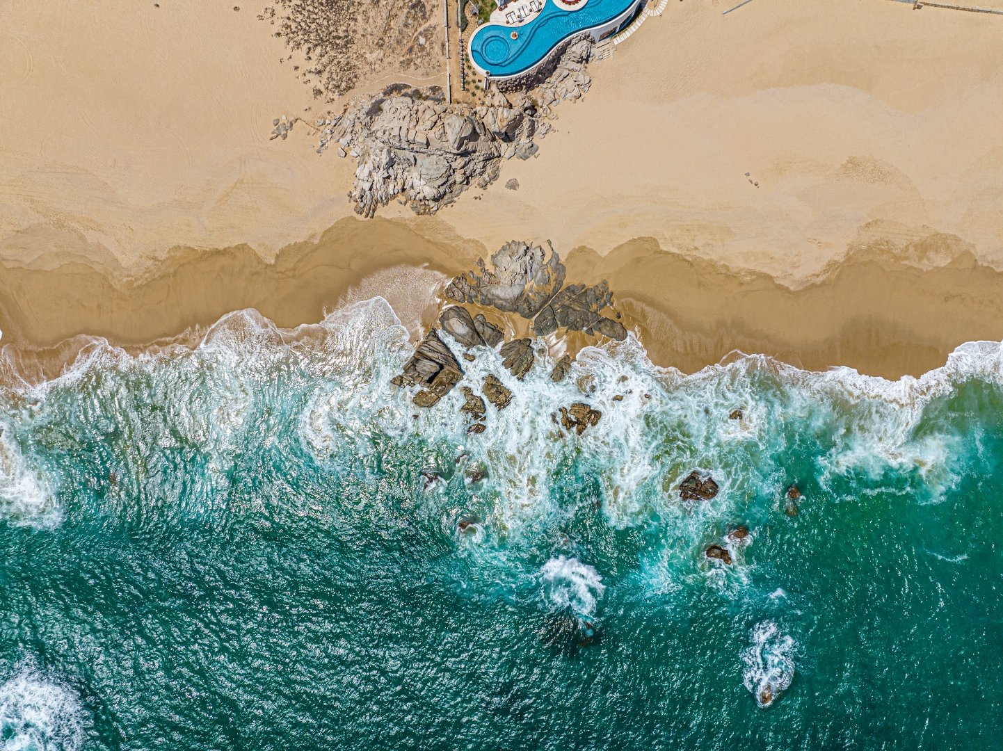 Aerial view of Villa Savina and the Pacific coast